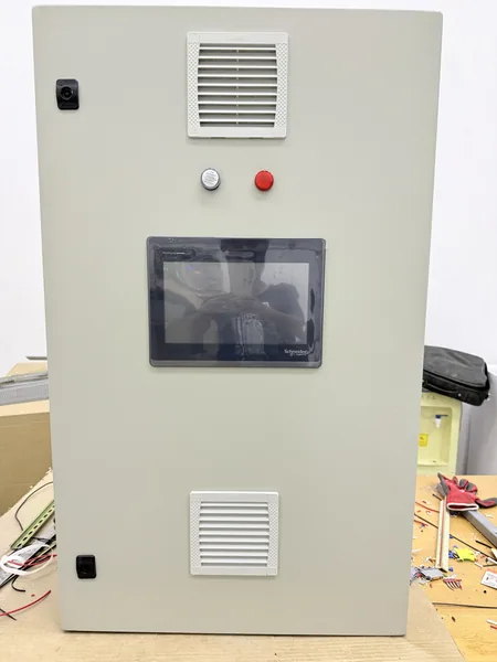 PLC control panel for Falaj Hazza Park with a 10 inch touch screen HMI on the door